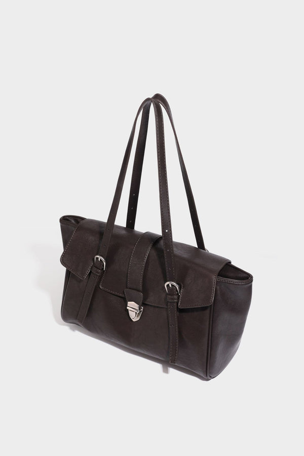 Large structured vintage-style tote bag with flap-front turn-lock closure, twin buckle straps, and double shoulder handles