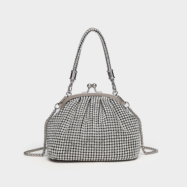 Kompakte Abendtasche mit rundum applizierten Strasssteinen, silberfarbenem Metallrahmen, Strass-Tragegriff und abnehmbarer Kette