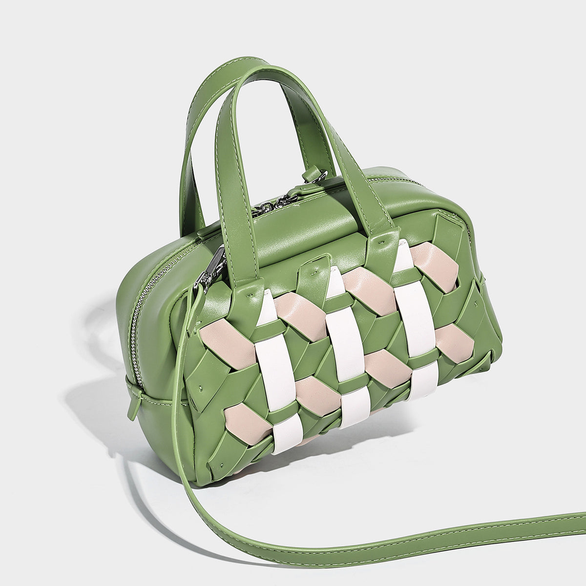 Small structured satchel bag with two-tone woven front panel, dual top handles, and detachable crossbody strap in tan brown