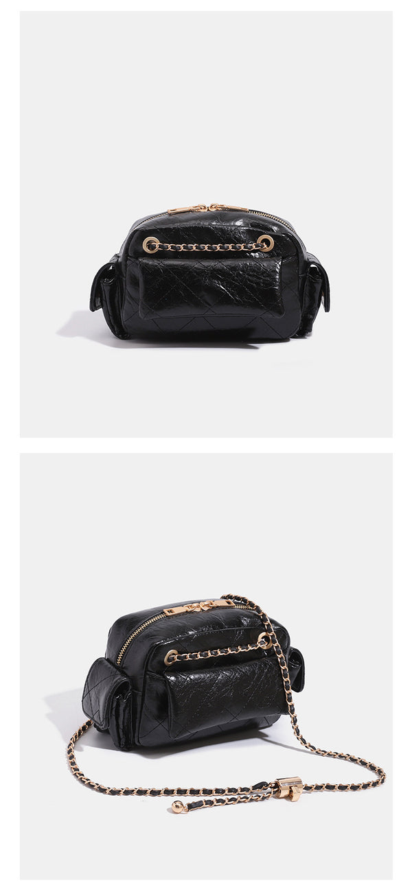 Compact quilted diamond-stitch crossbody bag with gold-tone chain strap and top zip closure, detail view 9