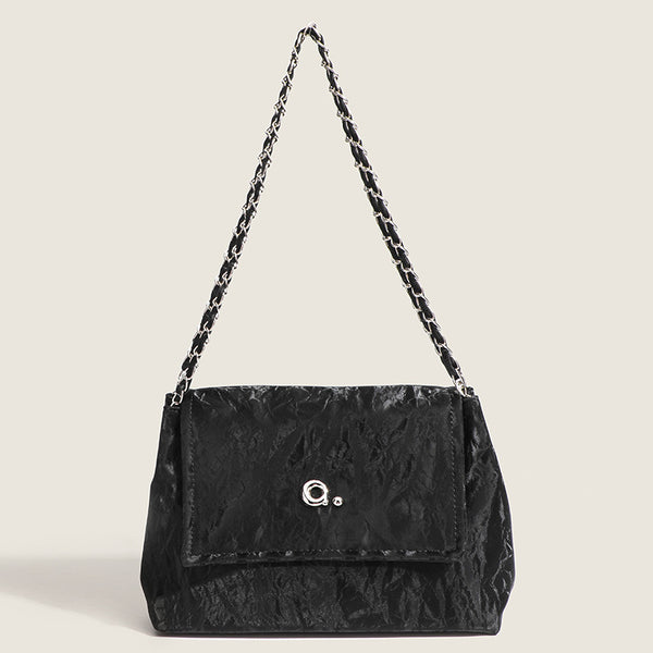 Crinkle-finish leather-look shoulder bag with woven tan-and-metal chain strap and front flap turn-lock closure, detail view 7