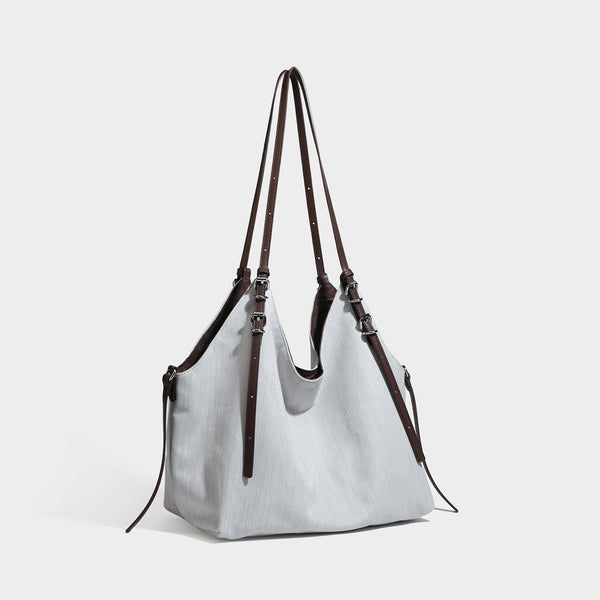 Oversized Hobo-Schultertasche in Olivgrün mit langen Doppelriemen in Lederoptik, silberfarbenen Schnallendetails und