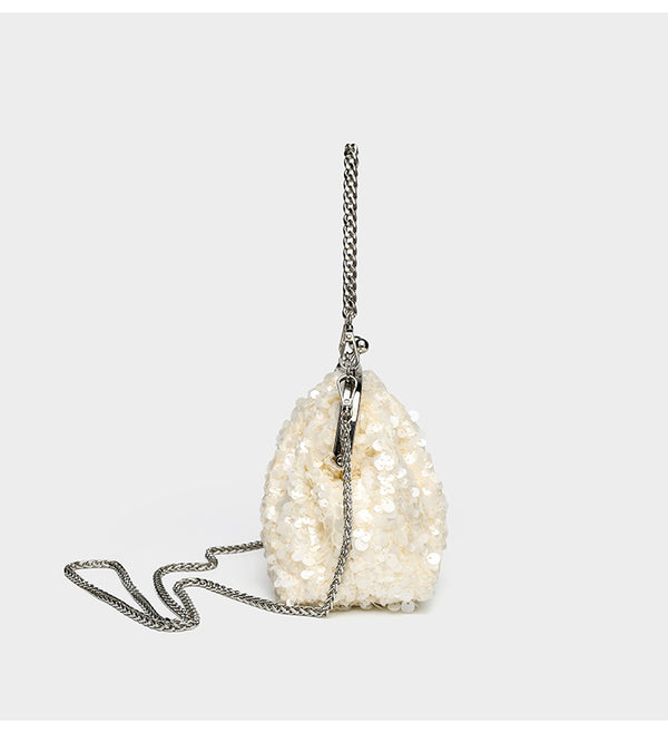 Small structured sequin kiss-lock evening bag with silver-tone chain strap in cream white, detail view 13