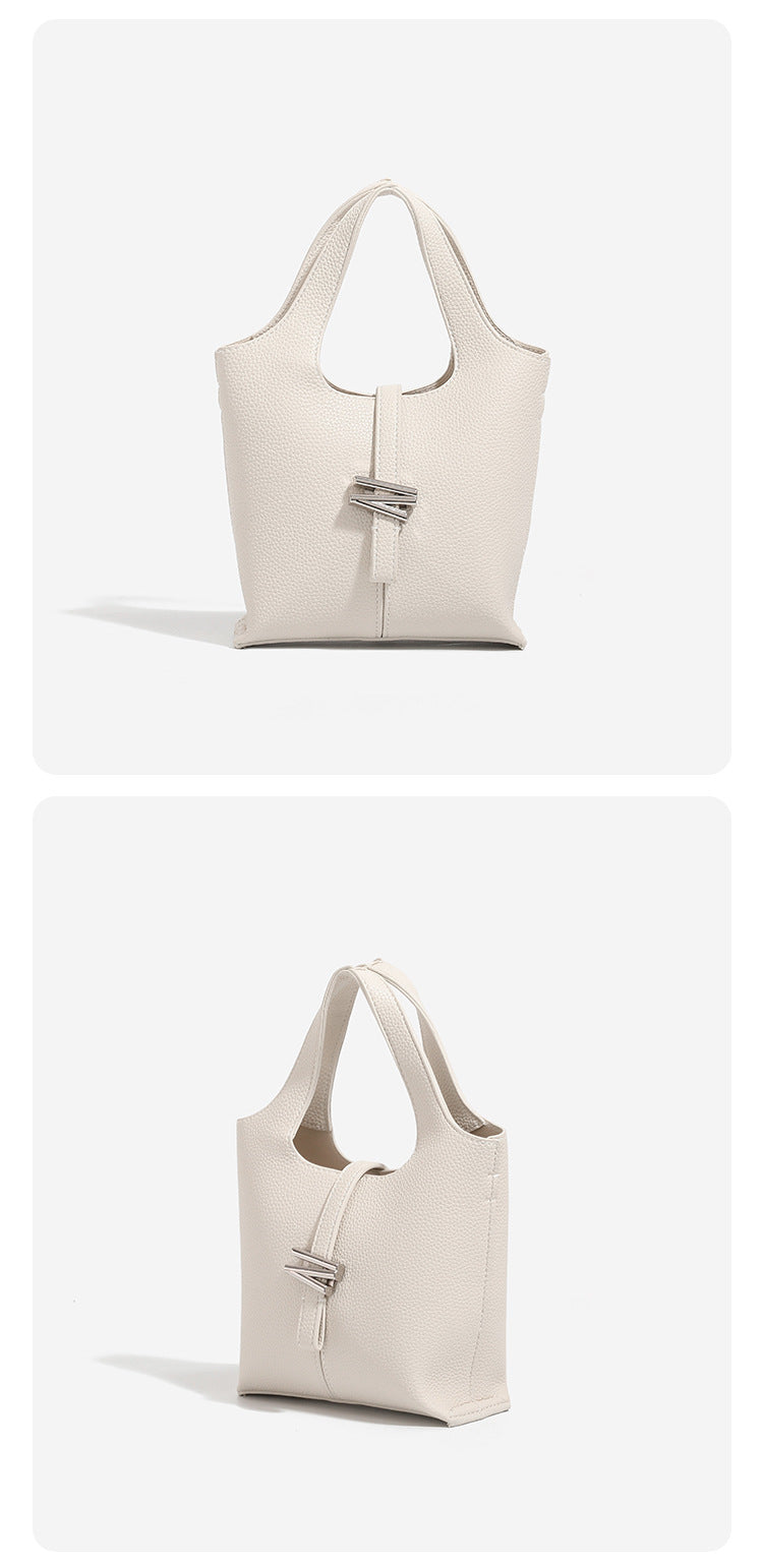 Mini pebbled leather-look bucket tote with silver toggle clasp and dual top handles, detail view 13