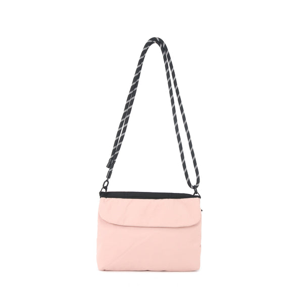 Flat rectangular crossbody bag with mesh front pocket, top zip closure, and adjustable patterned strap, detail view 9