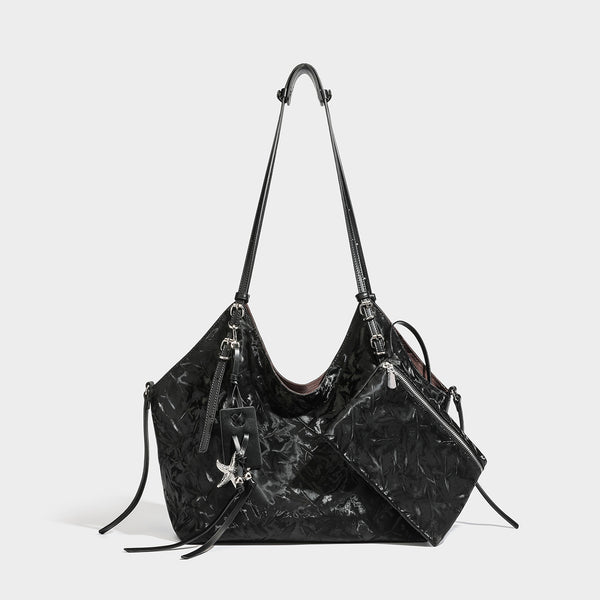 Slouchy crinkle-finish shoulder tote bag with silver hardware and attached zip pouch, detail view 2