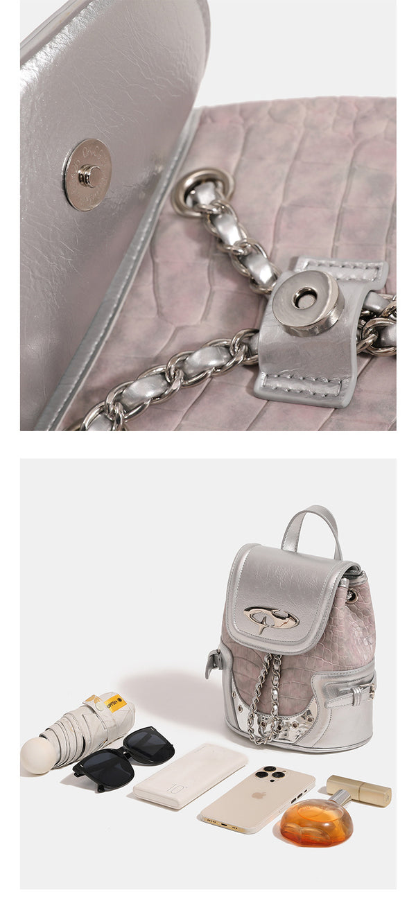 Croc-embossed mini backpack with silver metallic leather-look trim, decorative chain, and metal logo clasp, detail view 13