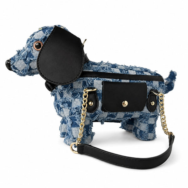 Dachshund-shaped frayed denim patchwork crossbody bag with black leather-look ear, gold-tone chain strap, and front, detail
