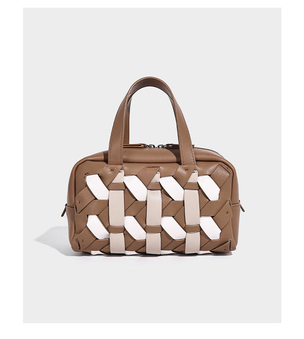 Small structured satchel bag with two-tone woven front panel, dual top handles, and detachable crossbody strap in tan brown