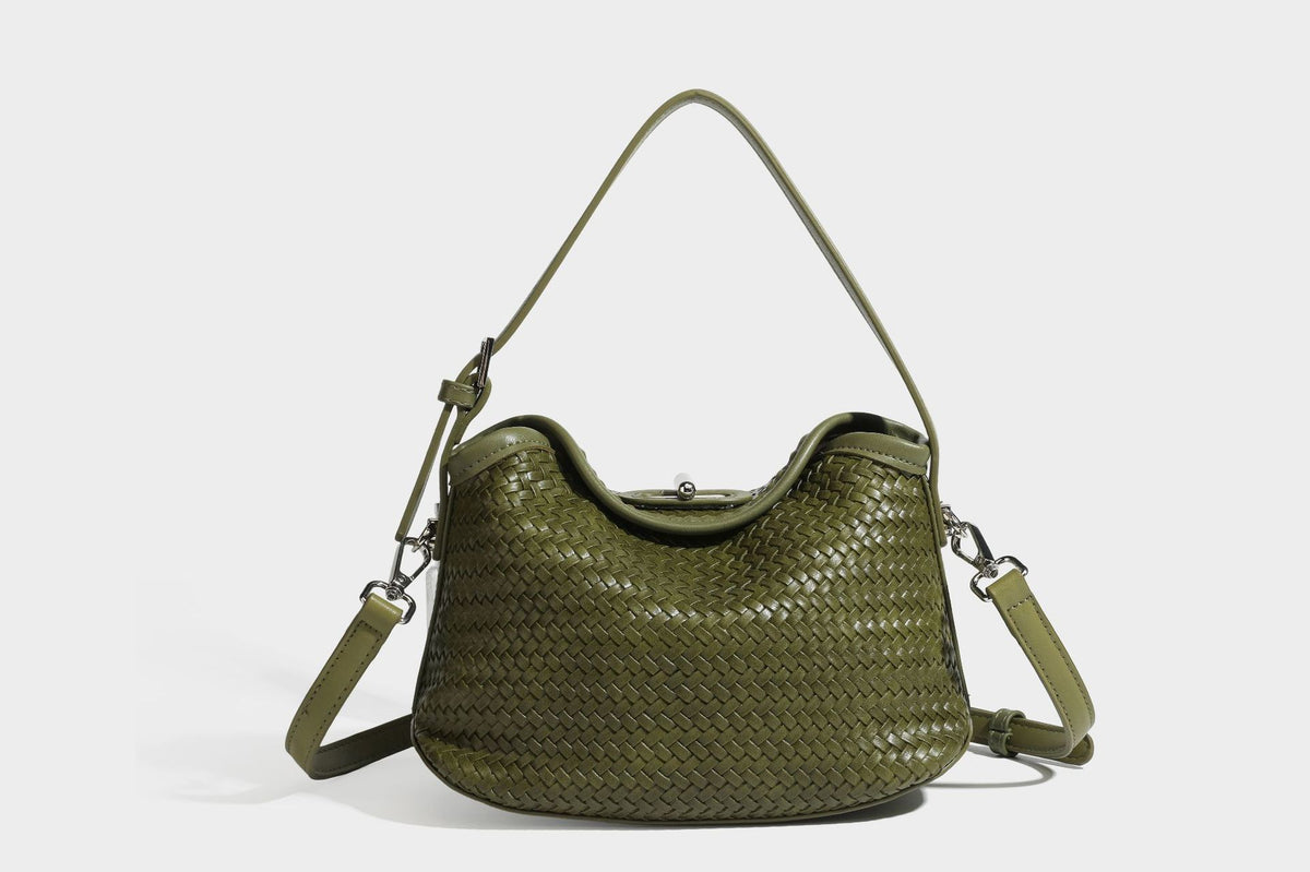 Small woven-look leather-look flap shoulder hobo bag in burgundy with silver-tone hardware and decorative tassel charm