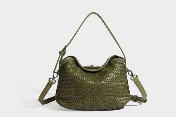 Small woven-look leather-look flap shoulder hobo bag in burgundy with silver-tone hardware and decorative tassel charm