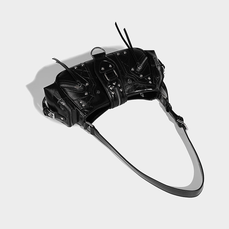 Compact glossy leather-look crossbody bag with silver studs, buckle hardware, and multiple zip pockets, detail view 24