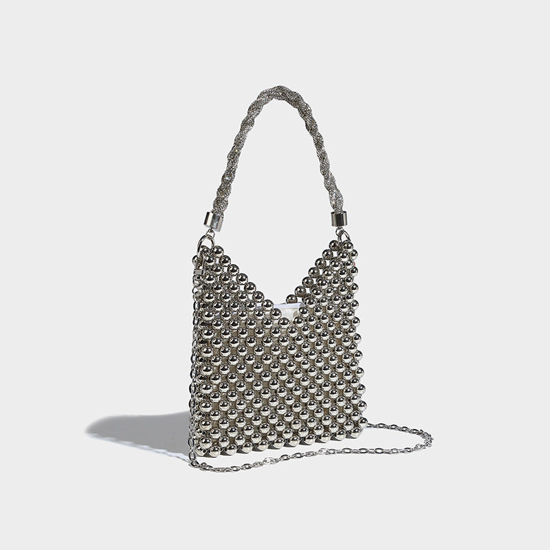 Small silver metallic beaded mini bag with braided rhinestone top handle and detachable chain crossbody strap, detail view 3