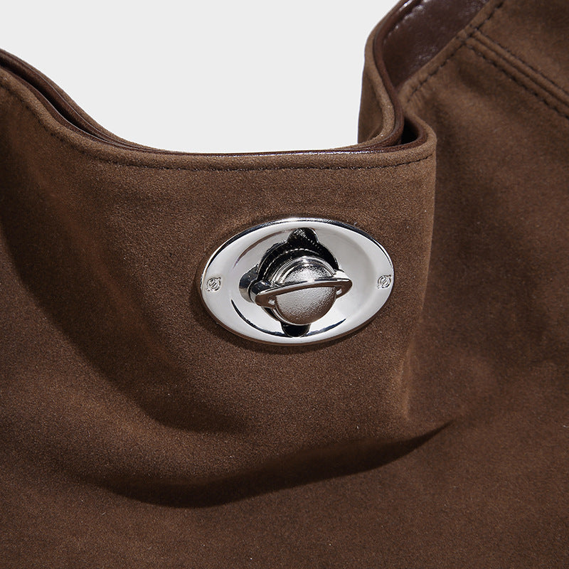 Slouchy hobo shoulder bag with turn-lock flap closure and adjustable strap, detail view 22