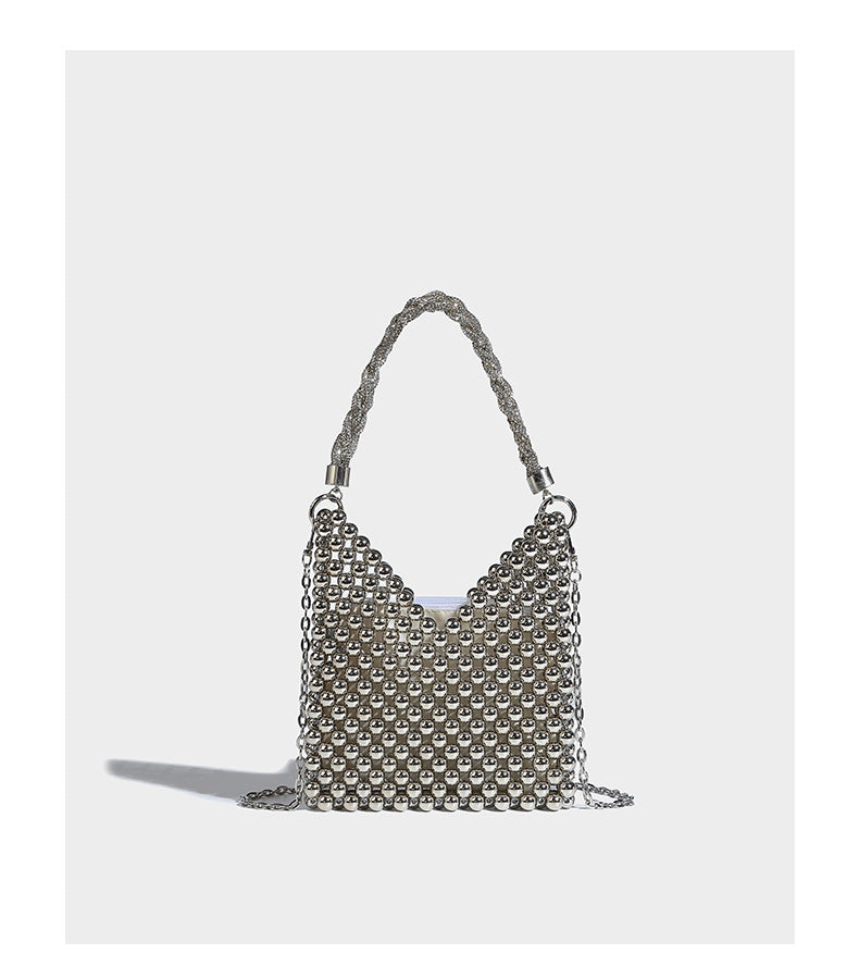 Small silver metallic beaded mini bag with braided rhinestone top handle and detachable chain crossbody strap, detail view 7