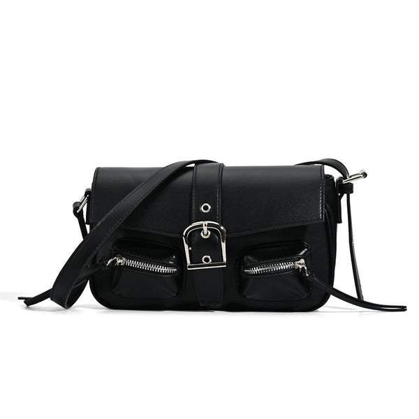 Structured flap crossbody bag with front buckle strap and dual zip pockets in smooth leather-look finish with silver-tone
