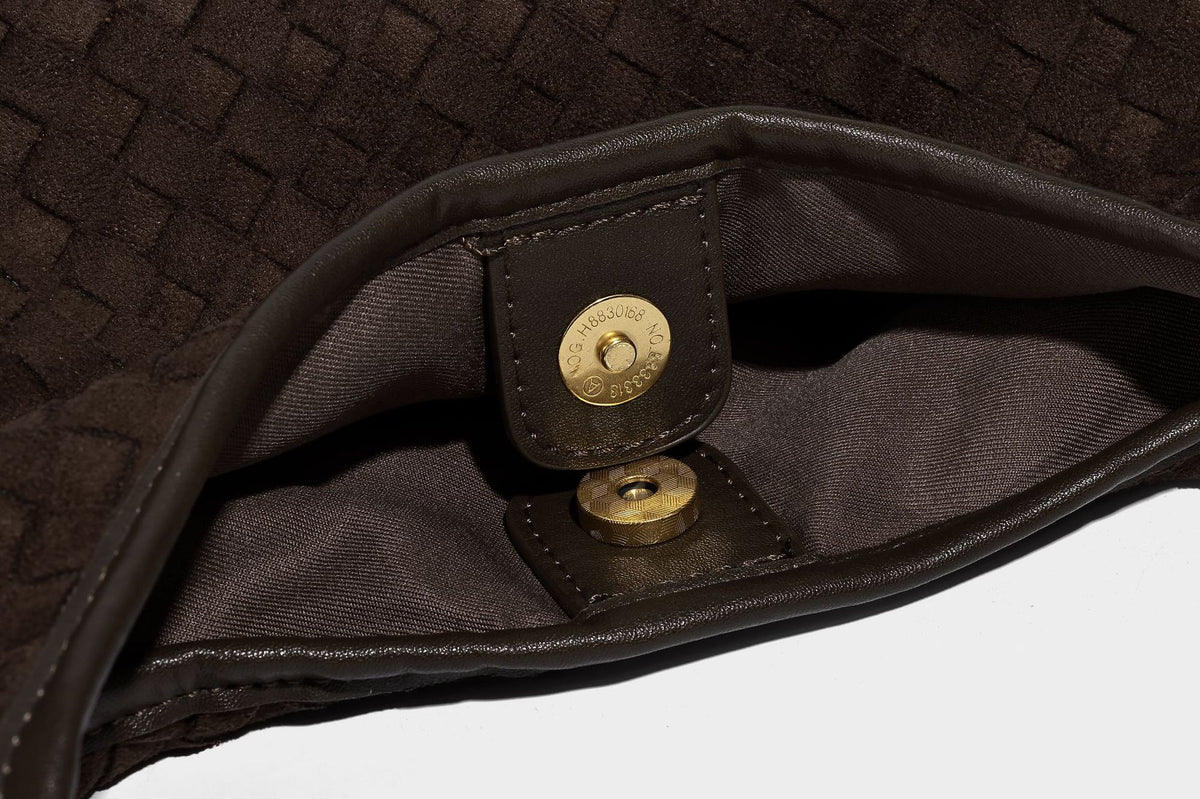 Large slouchy woven hobo tote bag with curved shoulder strap and triangular silhouette, detail view 20