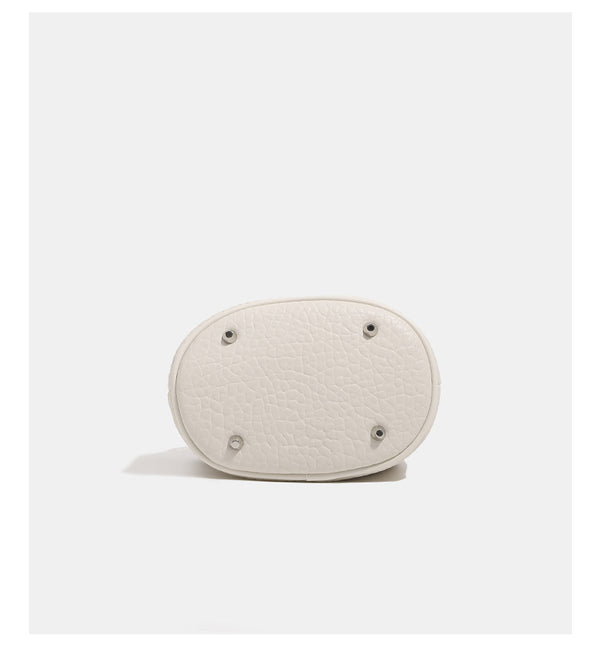 Mini pebbled leather-look bucket bag with chunky silver-tone chain handle and drawstring closure, detail view 15