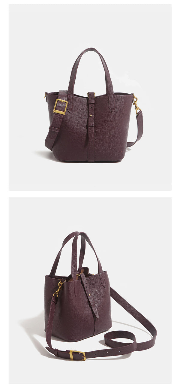Small structured pebbled leather-look bucket tote bag with dual top handles and silver-tone hardware, detail view 11