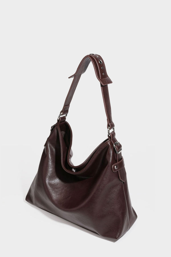 Large slouchy hobo shoulder bag in dark brown with smooth leather-look finish, adjustable strap, and silver-tone hardware