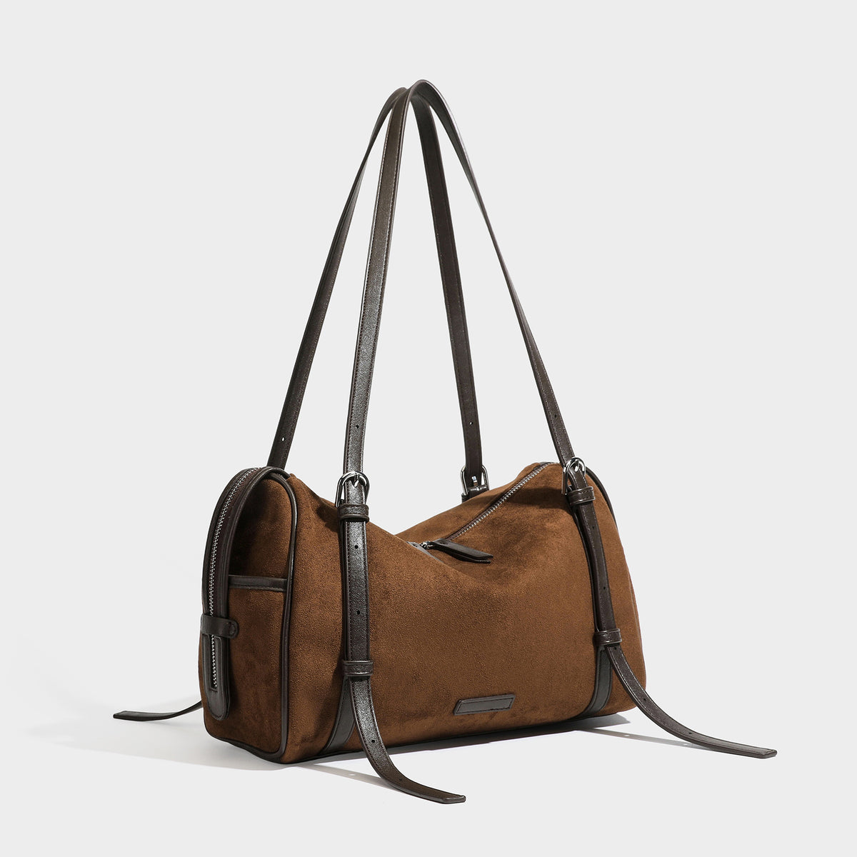 Large brown suede-finish barrel shoulder bag with dark leather-look trim, silver-tone zippers, dual top handles, and long