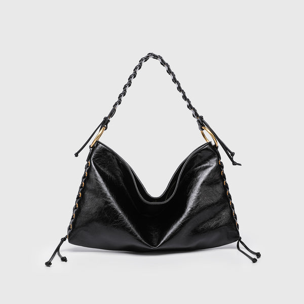 Large slouchy hobo shoulder bag with braided top handle, gold-tone O-ring hardware, and lace-up side cord detailing in
