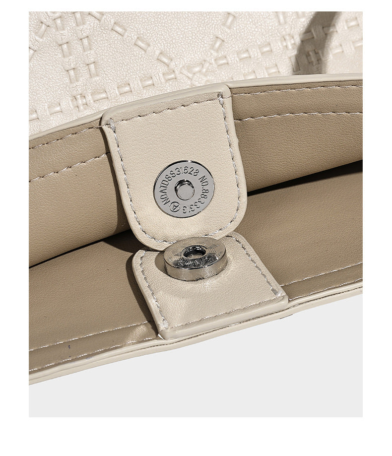 Quilted diamond-pattern tote bag with attached front zip pouch and long shoulder straps, detail view 13