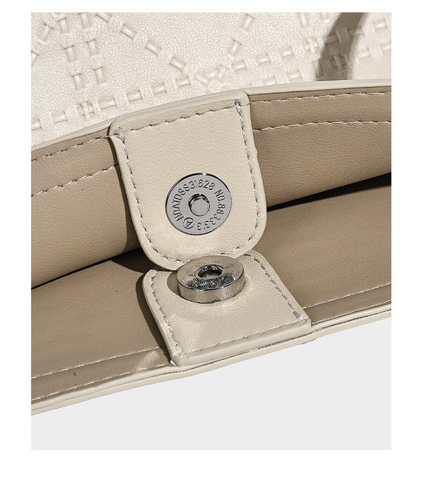 Quilted diamond-pattern tote bag with attached front zip pouch and long shoulder straps, detail view 13