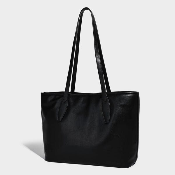 Große strukturierte Tote-Bag in Lederoptik mit zwei Schulterriemen und Metallanhänger-Beschlägen, Vorderansicht