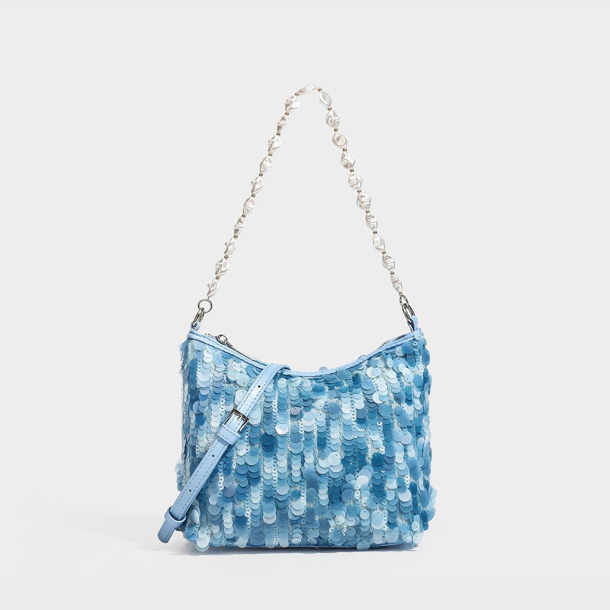 Champagne and ivory large-disc sequin shoulder bag with baroque faux-pearl beaded chain strap and silver-tone zip closure