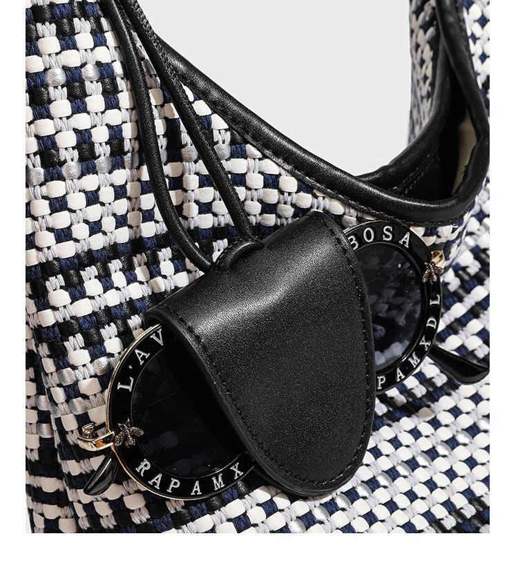 Slouchy woven stripe hobo shoulder bag with black-and-white pattern and leather-look strap, detail view 17
