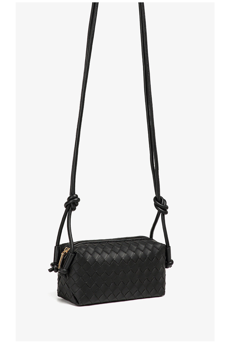 Small rectangular woven-texture mini crossbody bag with knotted rope strap and gold-tone zip closure, detail view 15