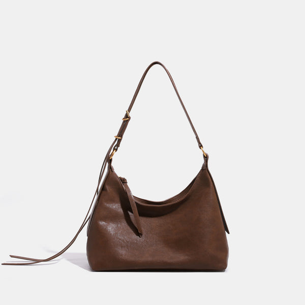 Slouchy hobo shoulder bag in smooth leather-look finish with gold-tone hardware and adjustable strap, detail view 7