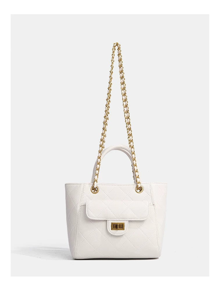 Diamond-quilted leather-look shoulder tote bag with gold-tone chain strap and dual top handles, detail view 12