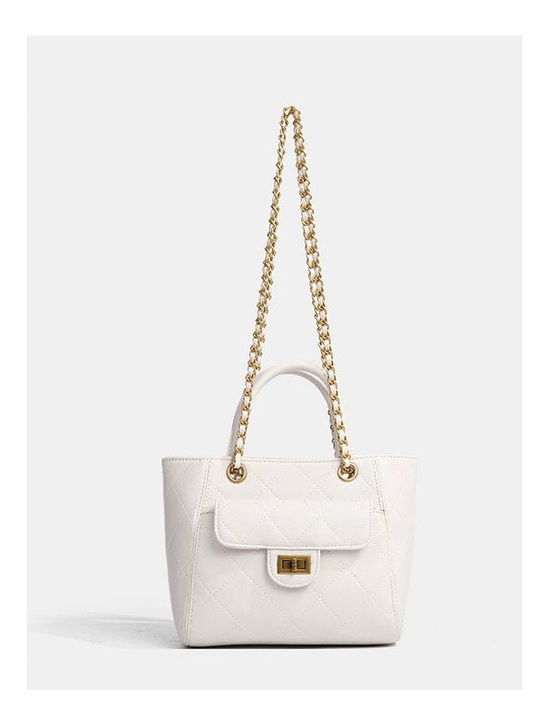 Diamond-quilted leather-look shoulder tote bag with gold-tone chain strap and dual top handles, detail view 12
