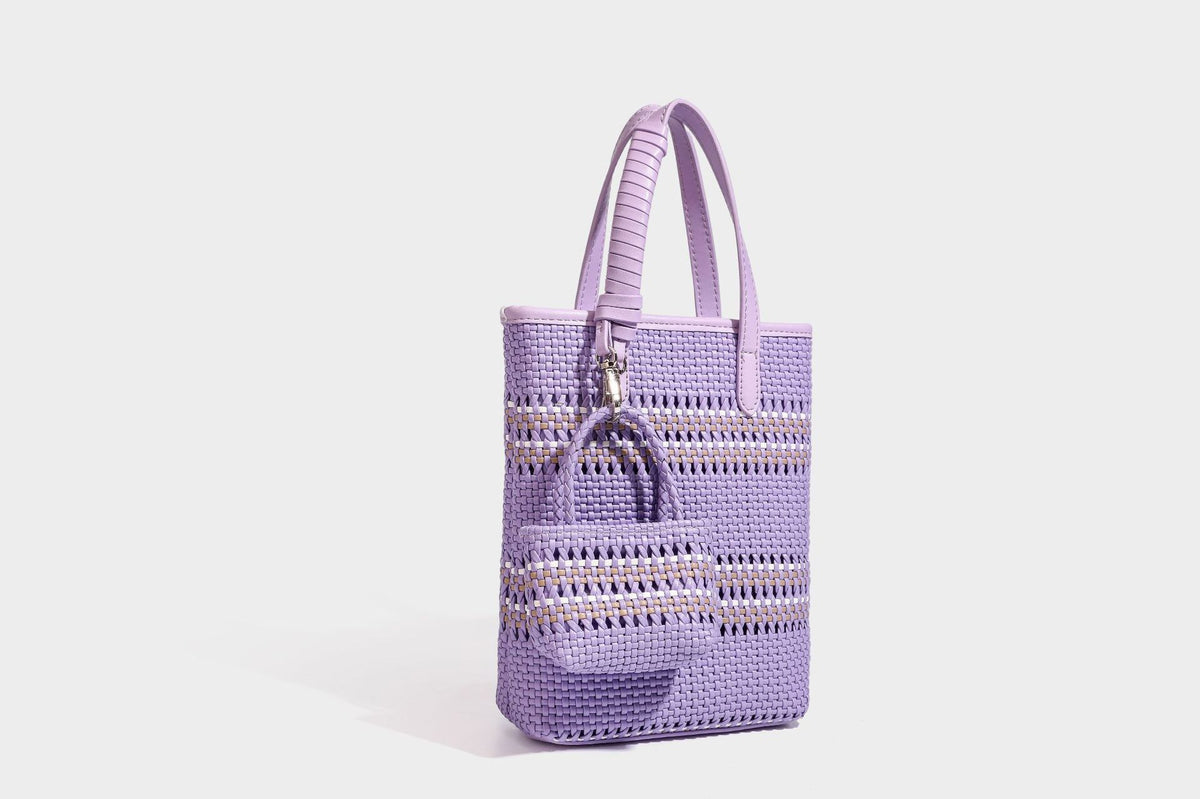 Kleine, formstabile Korb-Shopper-Tasche aus geflochtenem Material mit umwickelten Griffen in Lederoptik und silberfarbenen Verschlussbeschlägen, Detailansicht 40
