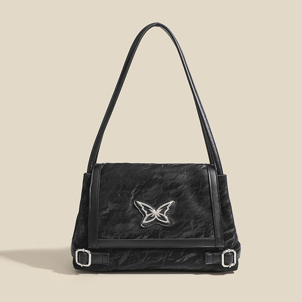 Structured crinkle-finish flap shoulder bag with butterfly metal appliqué and dark brown contrast trim, detail view 8