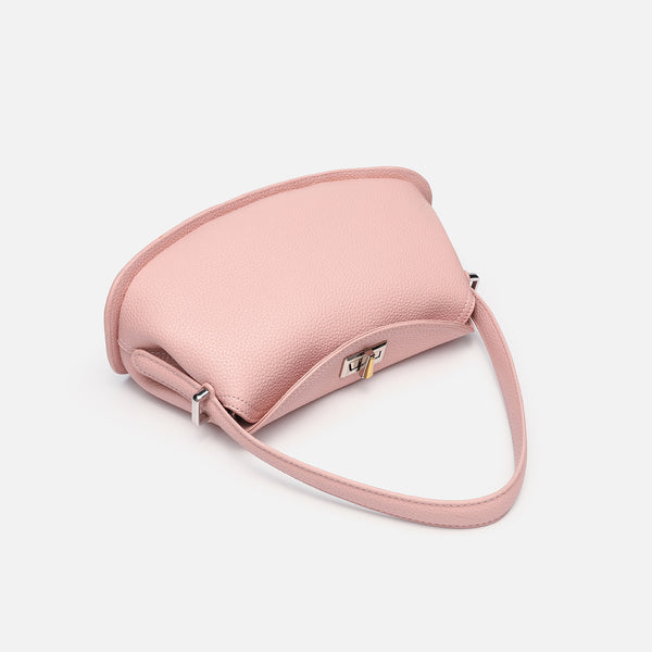Pebbled leather-look half-moon saddle bag with turn-lock flap closure, top handle, and detachable crossbody strap, detail