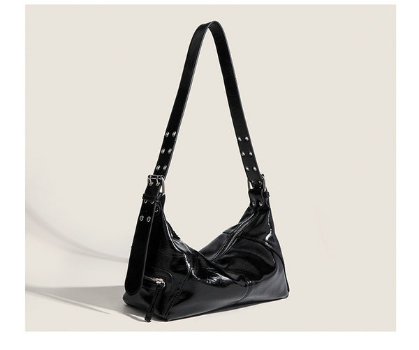 Glossy crinkled mini hobo shoulder bag with studded adjustable strap and silver-tone hardware, detail view 17
