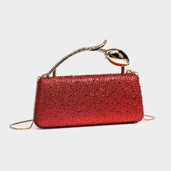 rectangular hard-case rhinestone evening clutch with sculptural gold-tone branch-and-bud top handle and detachable chain