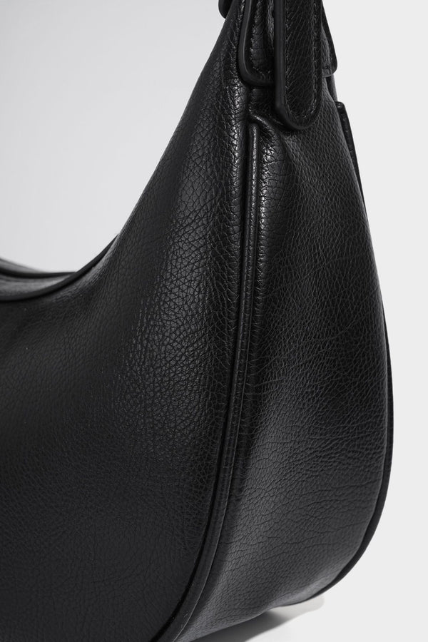 Crescent half-moon shoulder bag in pebbled leather-look finish with adjustable strap and silver-tone hardware, detail view 25