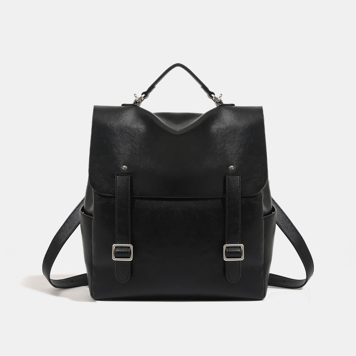 Structured flap backpack handbag in smooth leather-look finish with buckle front pocket, top handle, and silver-tone