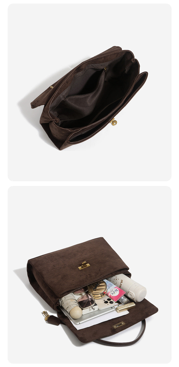 Large structured dark brown suede-finish satchel bag with gold-tone turn-lock closure, key charm accent, and detachable