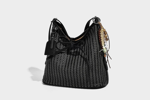 Slouchy open-weave shoulder tote bag with leather-look tan trim, tie-front closure, and long adjustable strap, detail view 13