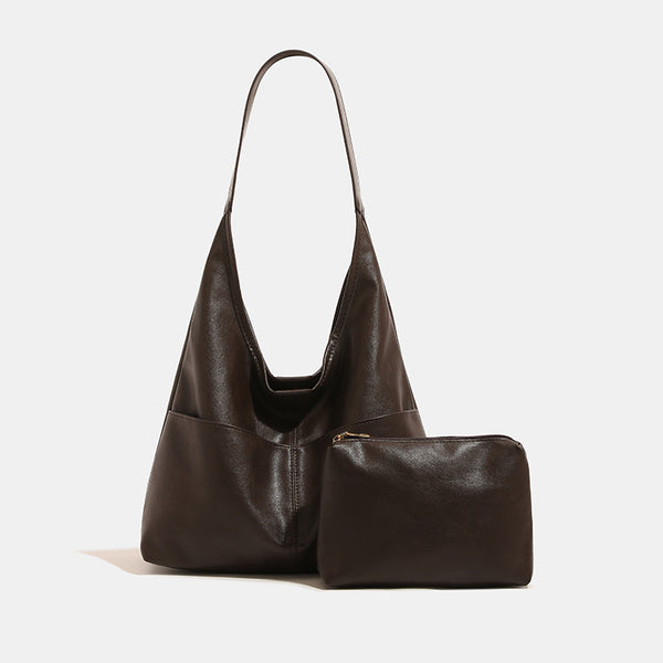 Oversized slouchy hobo tote bag in dark brown smooth matte leather-look finish with long flat shoulder strap and panelled