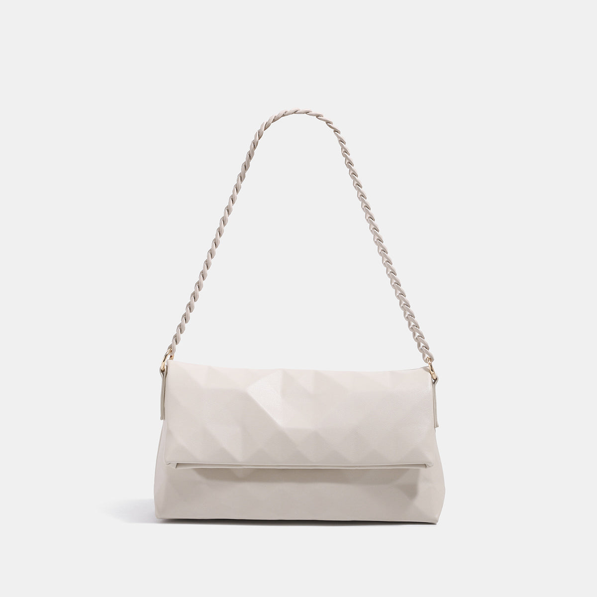 Geometric faceted flap shoulder bag with braided chain strap in black and ivory leather-look finish, front view