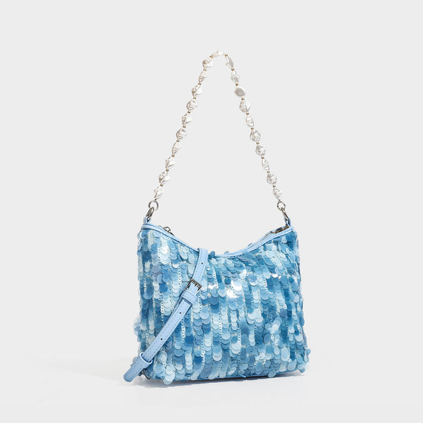 Champagne and ivory large-disc sequin shoulder bag with baroque faux-pearl beaded chain strap and silver-tone zip closure