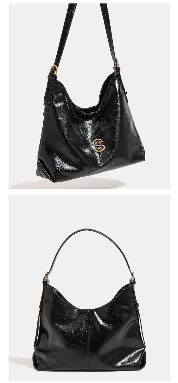Glossy crinkled hobo shoulder bag with gold-tone logo hardware and adjustable strap, detail view 7