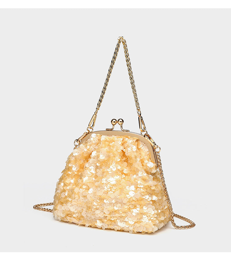 Small structured sequin kiss-lock evening bag with silver-tone chain strap in cream white, detail view 16