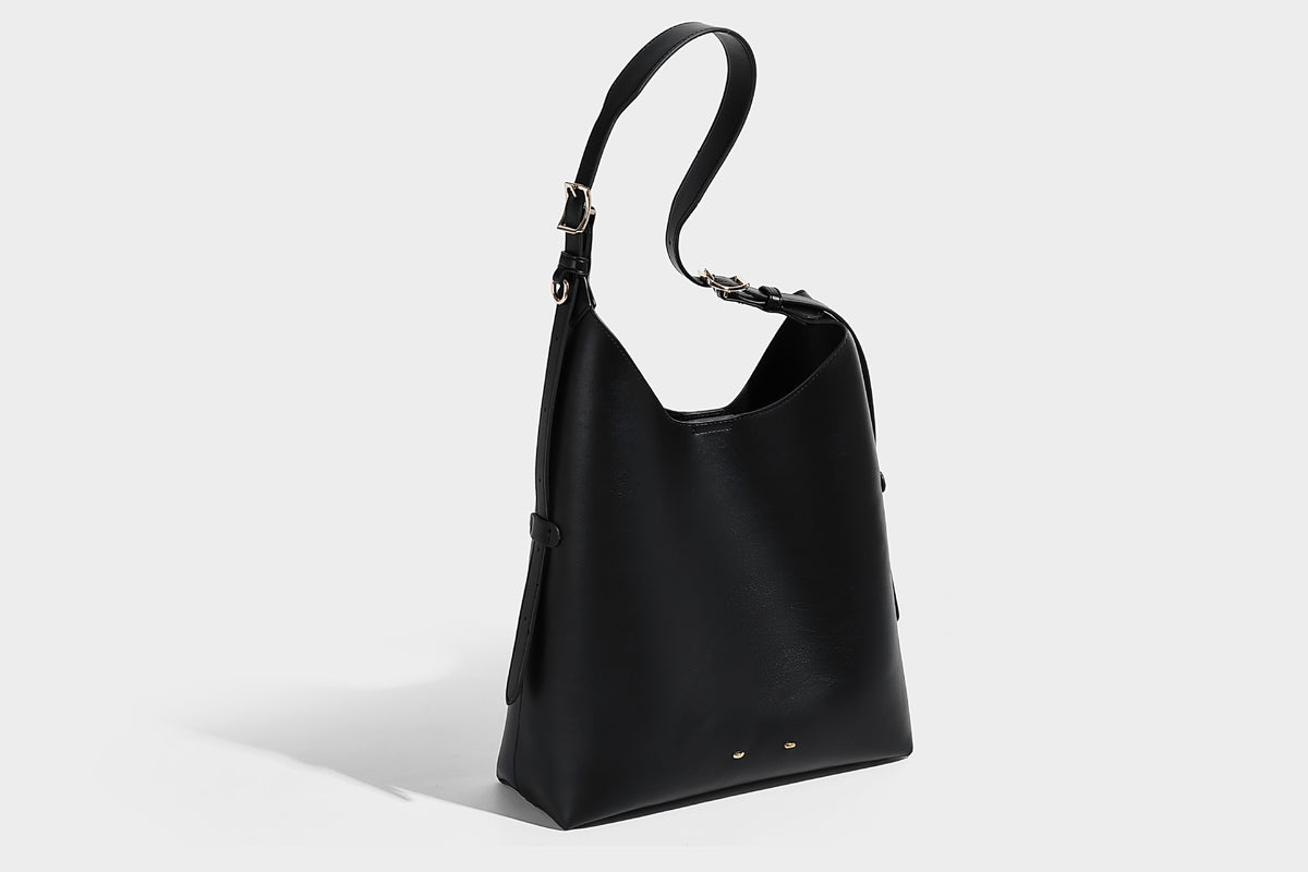 Large open-top hobo shoulder bag in tan leather-look finish with detachable zip pouch and adjustable buckle strap, detail
